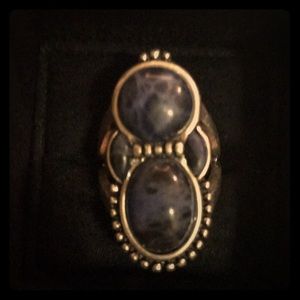 Silver rings with blue stones.